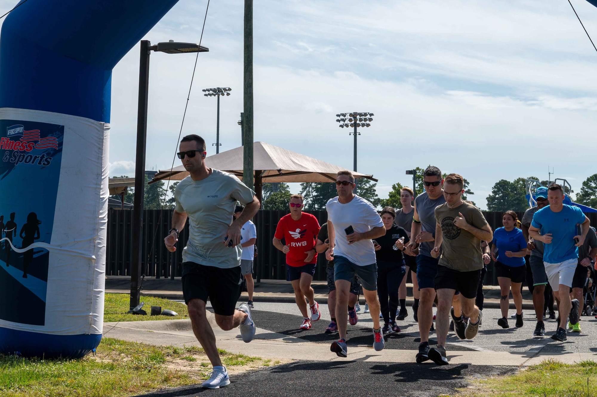 U.S. Air Force Airmen and personnel assigned to the 4th Fighter Wing participate in a 9/11 memorial run at Seymour Johnson Air Force Base, North Carolina, Sept. 11, 2024. The memorial run was held to honor and remember the first responders and those who lost their lives on Sept. 11, 2001. (U.S. Air Force photo by Airman 1st Class Rebecca Tierney)