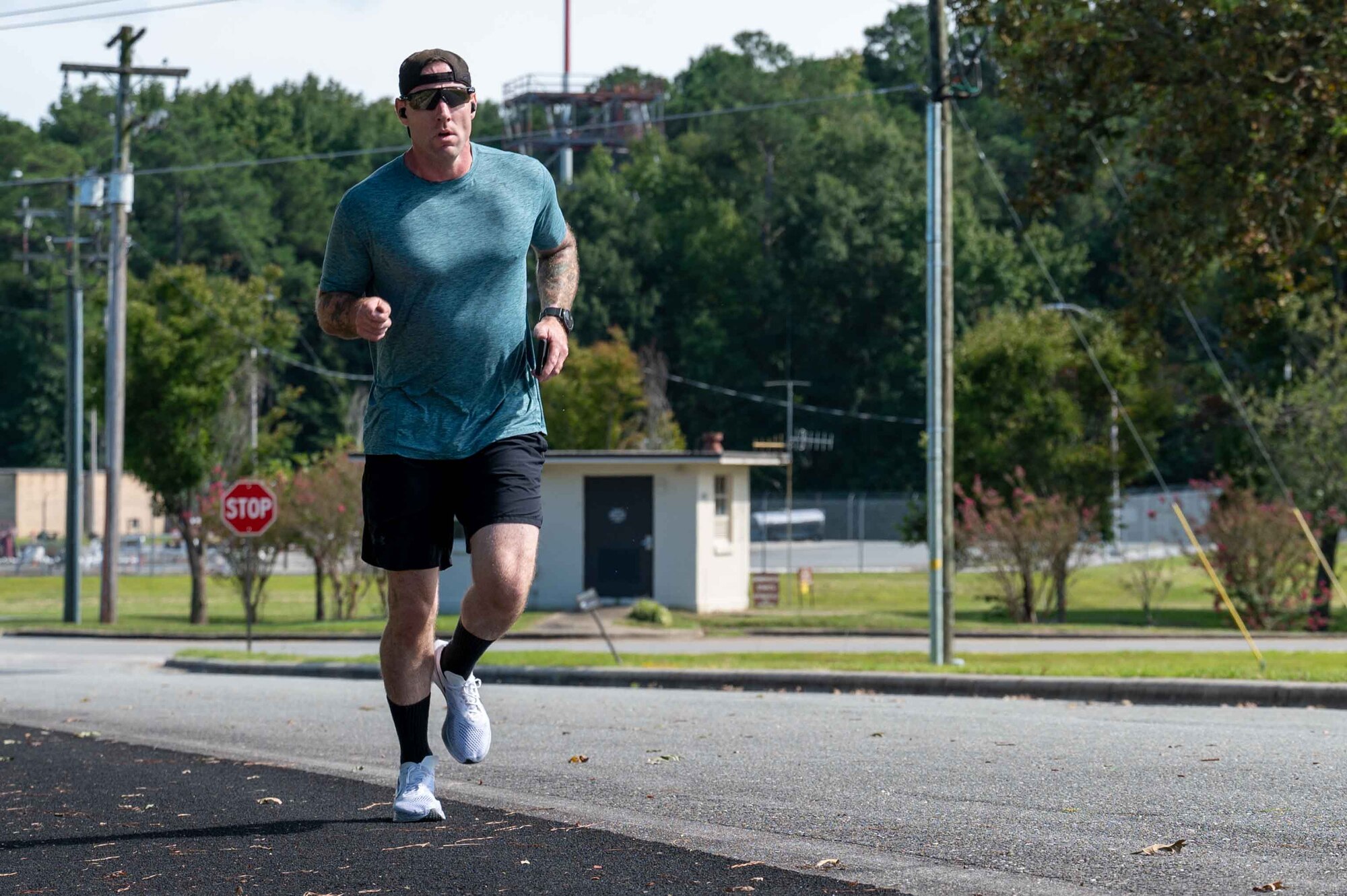 U.S. Air Force Airmen and personnel assigned to the 4th Fighter Wing participate in a 9/11 memorial run at Seymour Johnson Air Force Base, North Carolina, Sept. 11, 2024. The memorial run was held to honor and remember the first responders and those who lost their lives on Sept. 11, 2001. (U.S. Air Force photo by Airman 1st Class Rebecca Tierney)