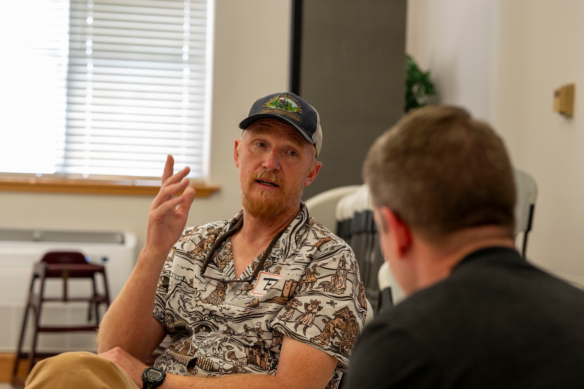 Ted Brinegar, 49th Wing integrated prevention chief, acts out a scenario with an Airman during an A.S.I.S.T. program meeting at Holloman Air Force Base, New Mexico, Aug. 27, 2024. The A.S.I.S.T. program is a hands-on course that teaches participants how to talk openly about suicide and work with individuals to create a series of safety plans. (U.S. Air Force photo by Senior Airman Isaiah Pedrazzini)