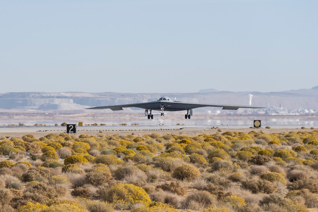 A B-21 Raider conducts flight testing, which includes ground testing, taxiing, and flying operations, at Edwards Air Force Base, California. The B-21 will be the backbone of the service’s future bomber force, and will possess the range, access and payload to penetrate the most highly-contested threat environments and hold any target around the globe at risk. The bomber platform is being developed through the Department of the Air Force Rapid Capabilities Office, which utilizes streamlined methods to develop, produce and field critical combat capabilities. (Courtesy photo)