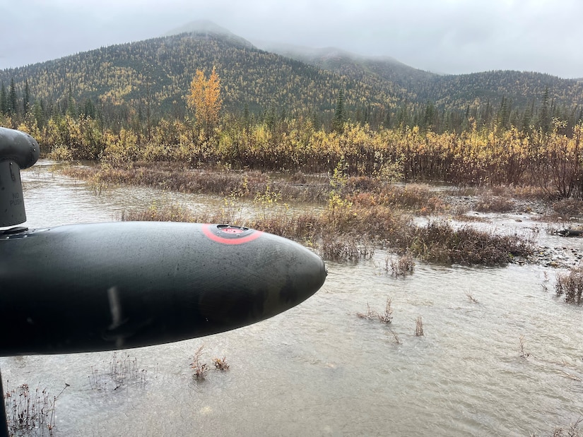 An Alaska Army National Guard UH-60L Black Hawk helicopter based in Bethel, Alaska, lands in a flooded area to rescue two stranded hunters along the rapidly rising Gagaryah River about 200 miles from Bethel Sept. 16, 2024. The AKARNG received a request from the Alaska Rescue Coordination Center after the hunters used a satellite communications device to call the Alaska State Troopers for assistance.