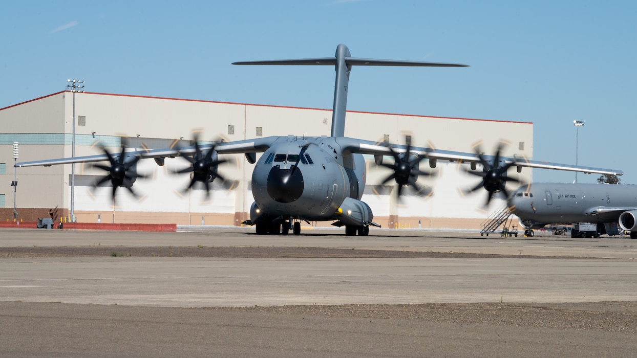 Foreign aircraft taxis on flight line