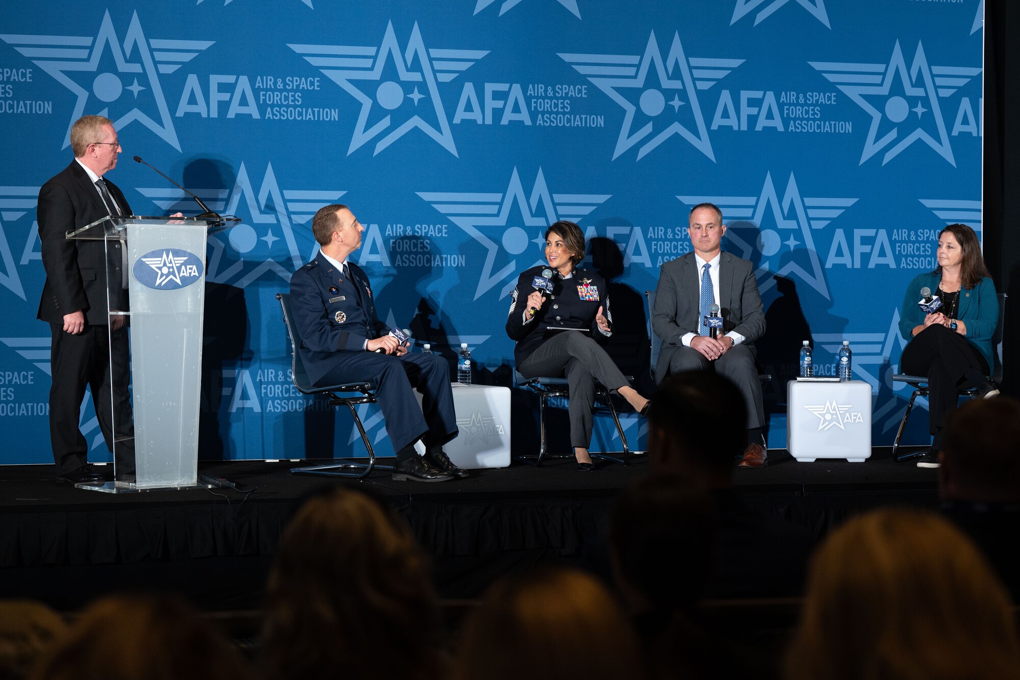 U.S. Space Force Chief Master Sgt. Karmann-Monique Pogue, center, the senior enlisted leader of STARCOM, speaks during the panel “Guardian Development: Officer, Enlisted, and Civilians” at the Air and Space Forces Association's Air, Space and Cyber Conference in National Harbor, Md., Sept. 18, 2024.