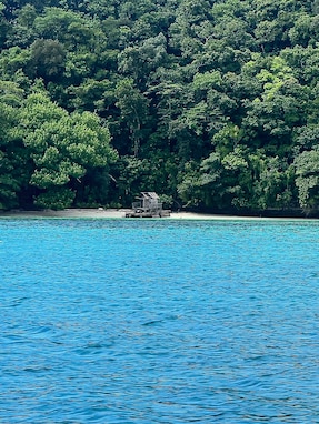 An illegal fish aggregating device sits washed ashore in the Republic of Palau as seen from a vessel on Sept. 9, 2024.