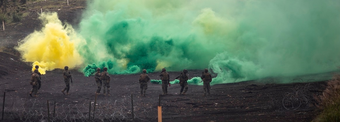 U.S. Marines with Marine Wing Support Squadron 171, Marine Aircraft Group 12, 1st Marine Aircraft Wing throw smoke grenades during a demolitions range conducted as a part of Exercise Outlaw Wrath 24 at Combined Arms Training Center Camp Fuji, Japan, Sept. 16, 2024.