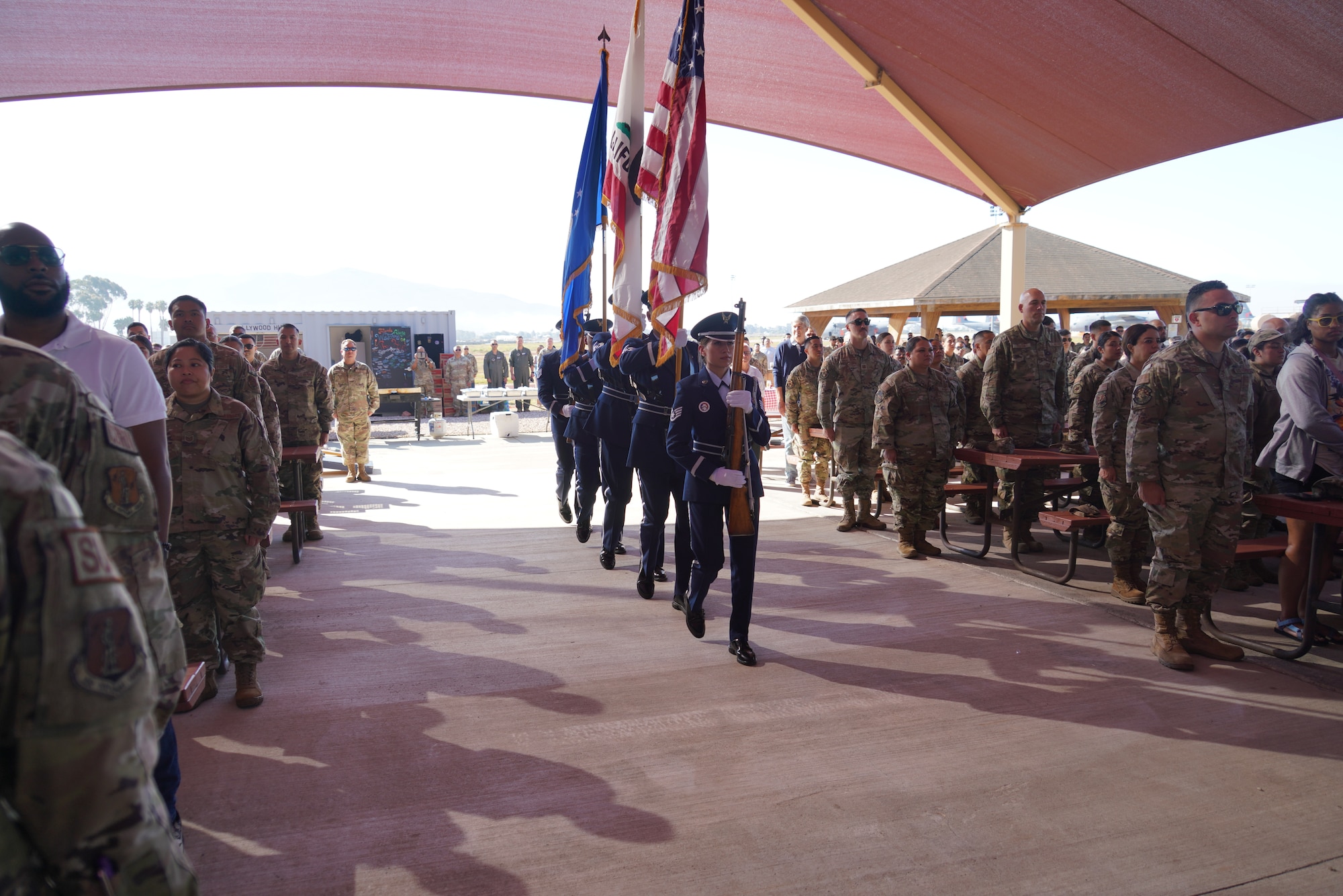 A U.S. Air National Guard Honor Guard team provide a color guard detail during an opening ceremony for the 146th Airlift Wing's centennial celebration at the Channel Islands Air National Guard Station, Port Hueneme, California, Aug. 4, 2024. U.S. Air National Guard photo by Tech. Sgt. Michelle Ulber.