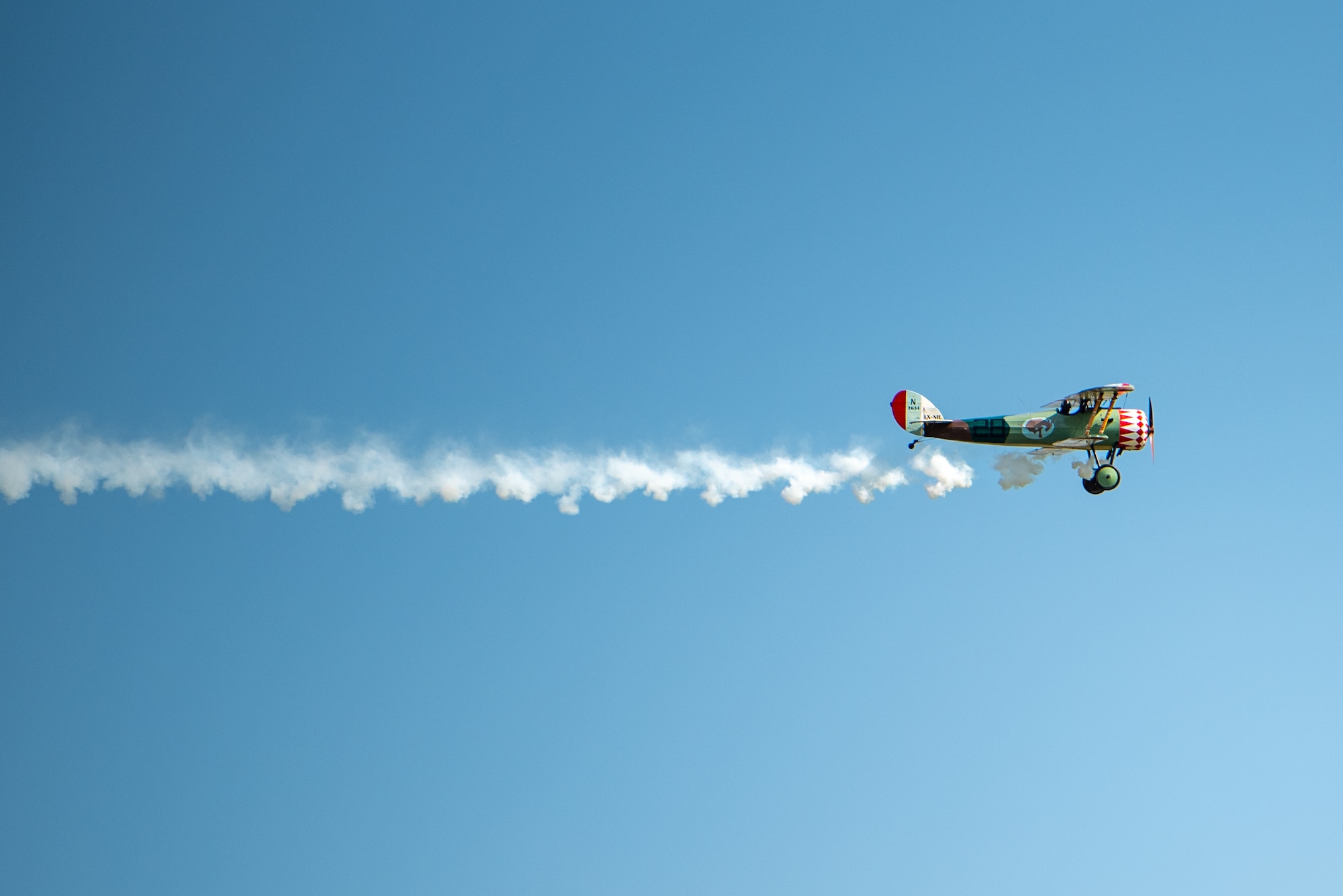 Paul Suace, local pilot, flies a Nieuport 28 during the reinterment ceremony for Capt. Hamilton Coolidge in Chevières, France.
