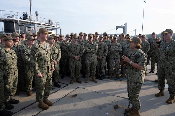 CNO Adm. Lisa Franchetti presents the Arctic Service Medal to the crew of the Virginia-class attack submarine USS Indiana (SSN 789).