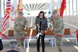 Hon. Rachel Jacobson, assistant secretary of the Army for installations, energy, and environment, Brig. Gen. Christopher W. Cook, deputy commanding general of the 63d Readiness Division, and Col. Stephen Trotter, garrison commander of Fort Hunter Liggett, cut the ribbon during the commissioning of Fort Hunter Liggett’s microgrid. This microgrid represents a significant milestone in the Army’s sustainability efforts, contributing to Fort Hunter Liggett's goal of achieving net-zero energy by 2030, ahead of federal targets. (U.S. Army photo by Sgt. 1st Class Ron Keenan)