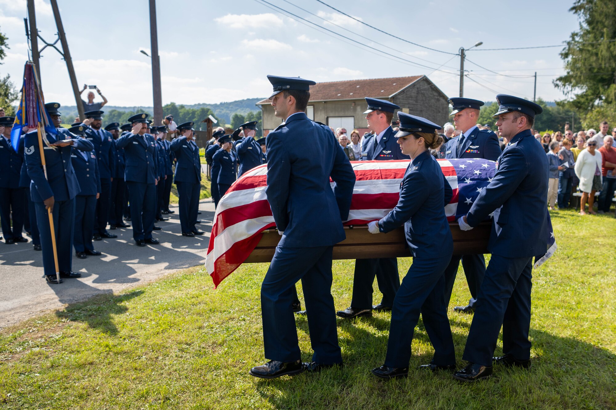 CHEVIÈRES, France – U.S. Air Force Airmen from the 94th Fighter Squadron carry the casket of Capt. Hamilton Coolidge during a reinterment ceremony at the Eglise Saint Martin in Chevières, France, Sept. 15, 2024. Coolidge, a pilot with the 94th Aero Squadron during World War I, was killed in action in 1918. The event marked a poignant moment of remembrance for those who served and gave their lives during the war. (U.S. Air Force photo by Airman 1st Class Albert Morel)