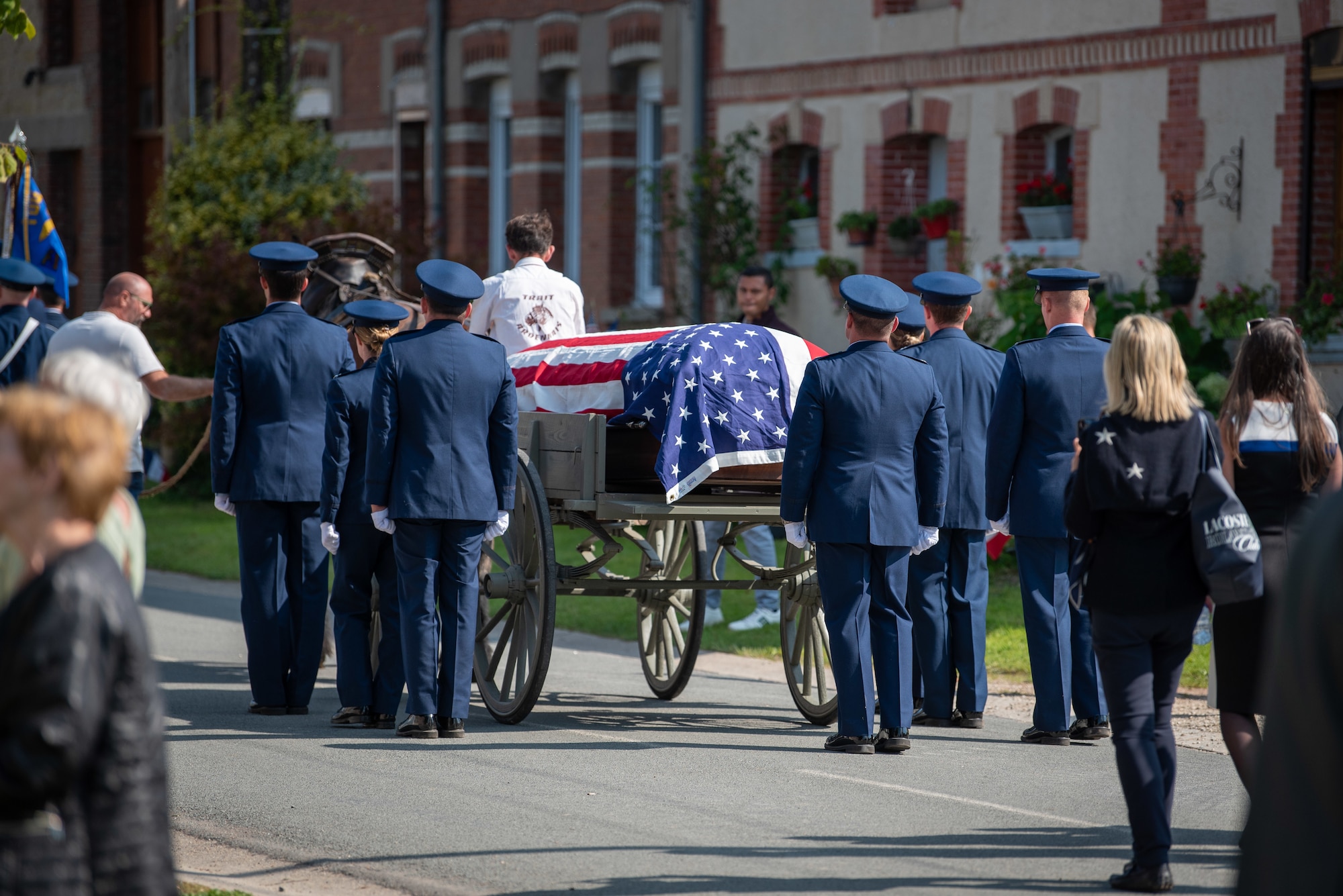 CHEVIÈRES, France – U.S. Air Force Airmen from the 94th Fighter Squadron escort the remains of Capt. Hamilton Coolidge to his final resting area during a reinterment ceremony in Chevières, France, Sept. 15, 2024. The ceremony included military honors for Coolidge, who served as a fighter pilot and flight lead with the 94th Aero Squadron in World War I. (U.S. Air Force photo by Airman 1st Class Albert Morel)