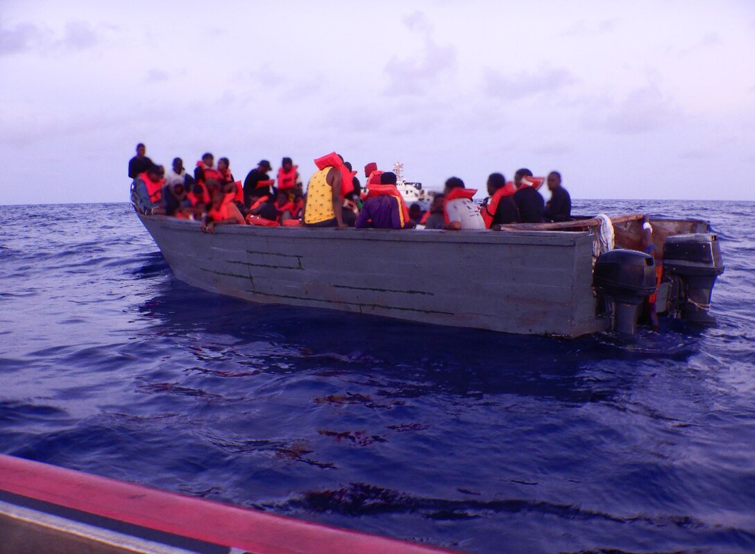 Law enforcement small boat crews from Coast Guard Cutter Bear and Kathleen Moore intercept a migrant vessel 22 miles north of Île de la Tortue, Haiti, Sept. 14, 2024. The migrants were repatriated to Cap-Haitien, Haiti, Sept. 18, 2024 following the interdiction. (U.S. Coast Guard photo)