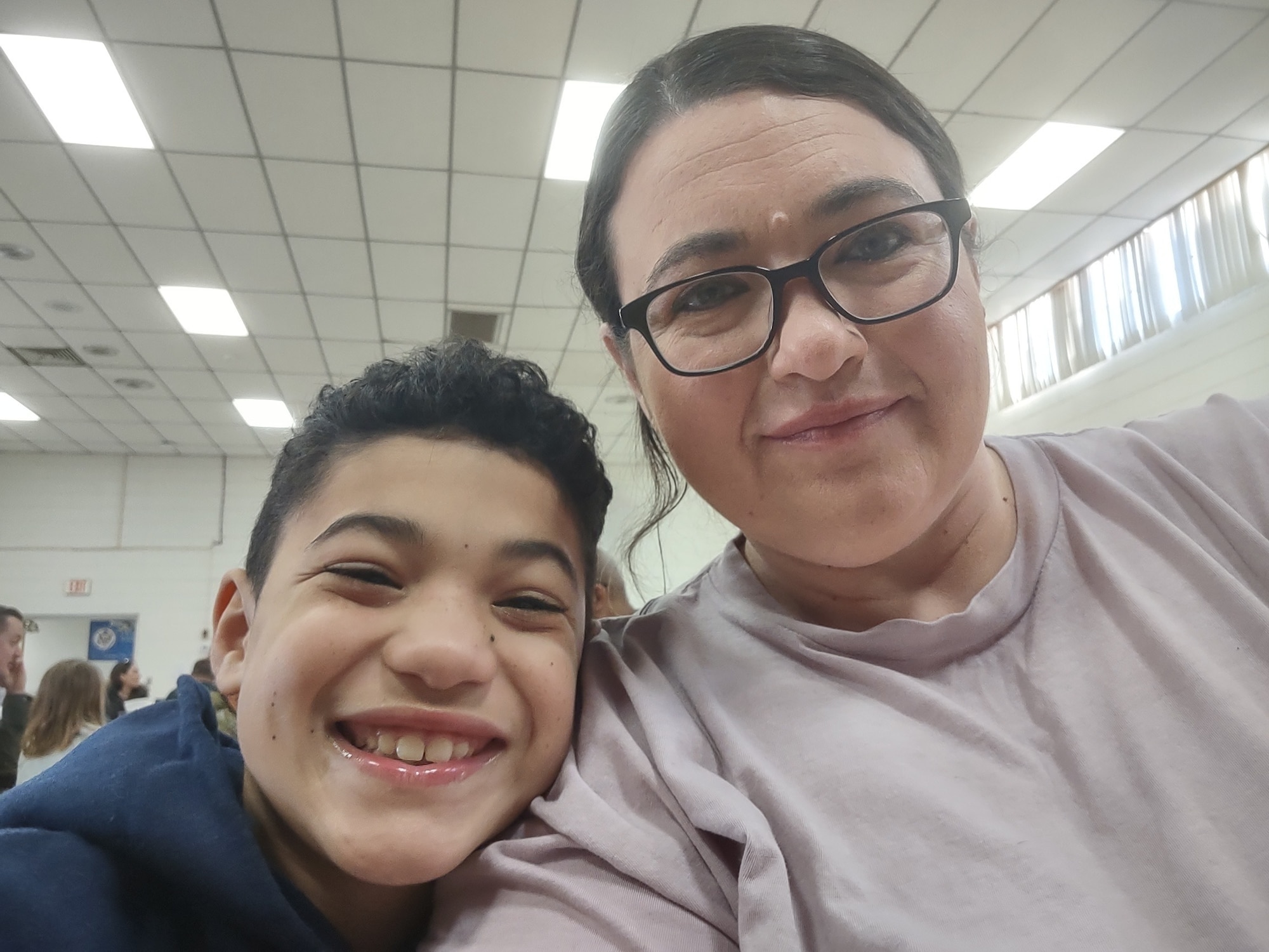 Stephanie Gray, 97th Force Support Squadron Child Development Center (CDC) program lead teacher, takes a selfie photo with her son Treyson Gray at Altus Air Force Base, Oklahoma, March 3, 2024. Gray was motivated to work as a teacher at the CDC after seeing the impact it had on her own child when he was 3 years old. (Courtesy photo by Stephanie Gray)