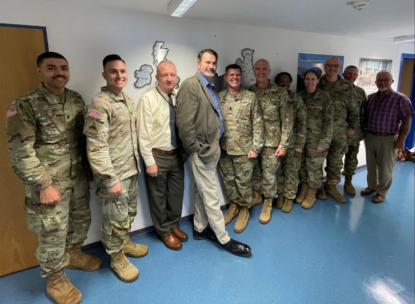 A group of soldiers pose for a picture.