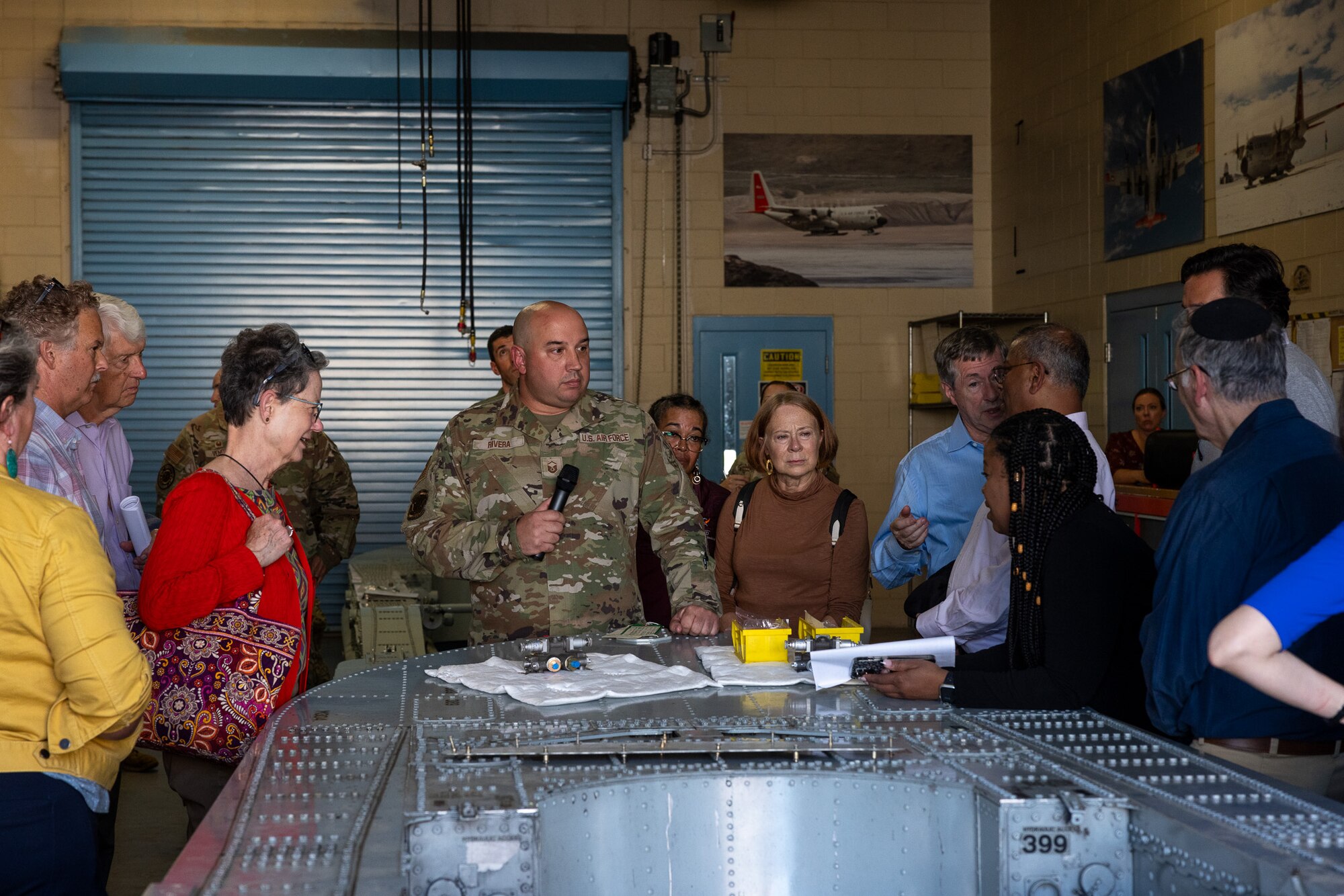 National Science Board are touring a LC-130 Hercules during a visit to Stratton Air National Guard Base on Sept. 12, 2024.