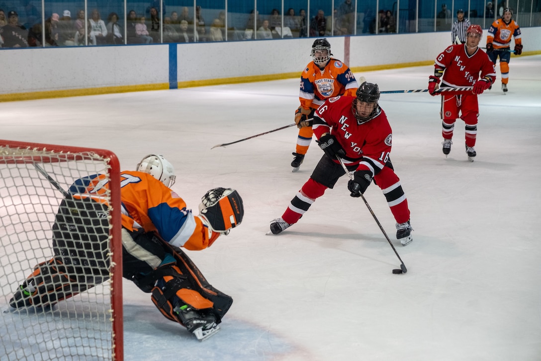 Aviation Maintenance Technician 3rd Class (AMT3) Andrew Slobiski blocks a goal during the second game in the 2024 Tunnels to Towers Heroes Cup against the New York City Fire Department (FDNY) on September 14, 2024, in Morristown, New Jersey. The Coast Guard Hockey team claimed victory in the 2024 Tunnels to Towers Heroes Cup representing Coast Guard active duty, reserves, and veterans while raising funds for the Tunnel to Towers Foundation. (Coast Guard photo by Petty Officer 2nd Class Sydney Phoenix)