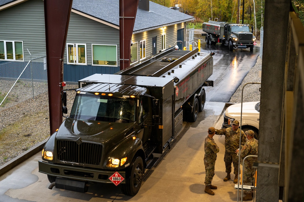 R11 aircraft refueling vehicles, assigned to the 354th Logistics Readiness Squadron, drive into the Defense Fuel Supply Point at North Pole, Alaska, Sept. 13, 2024.