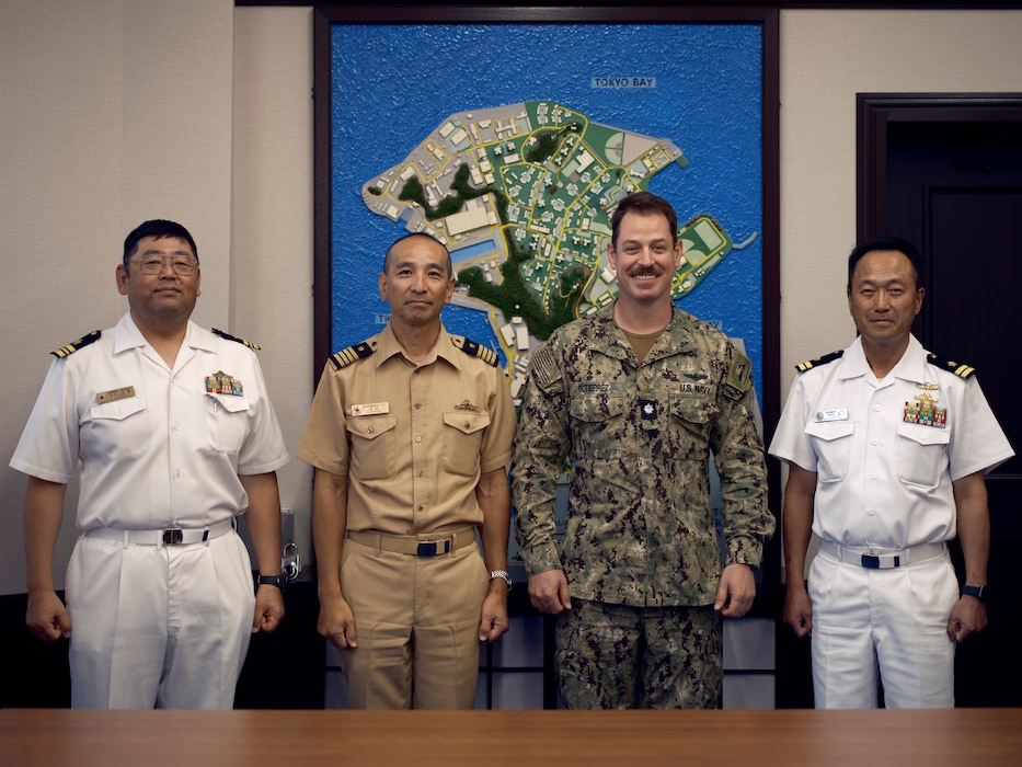 Japan Maritime Self-Defense Force Capt. Hisachika Yoshida, Commanding Officer, Area Guard Group Yokosuka, (center)and his staff officers visit Commander, Fleet Activities Yokosuka's Chief Staff Officer, Cmdr. Patrick Gutierrez, September 12, 2024.