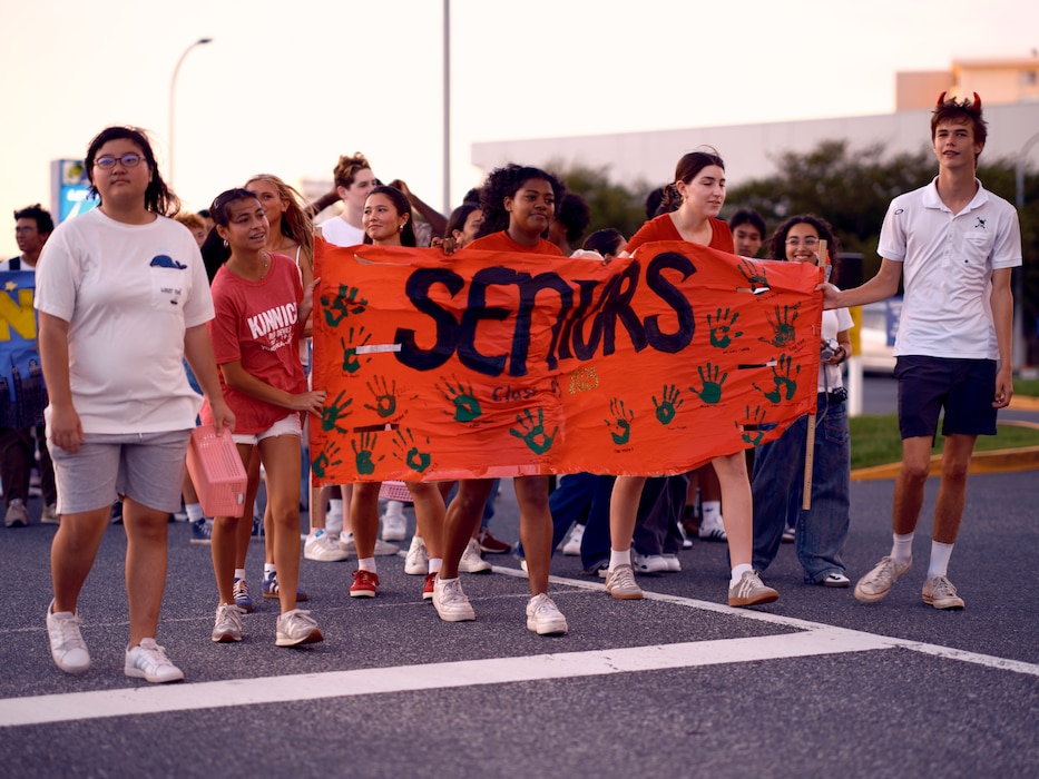 The Nile C. Kinnick High School senior class marches in school's homecoming parade September 13, 2024. Kinnick defeated visiting Zama High School 35-7 in the homecoming game later in the evening.