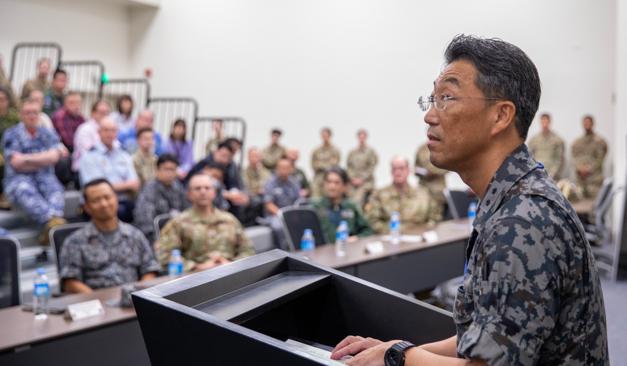 Japan Air Self-Defense Force Maj Gen. Teru Matsuzaki, Air Defense Command chief of staff, gives remarks during Far East Tactics Analysis Conference at Yokota Air Base, Japan, Sept. 13, 2024. The FETAT conference is an annual event that brings together operators and intelligence professionals from around the world to collaborate on information related to adversary air tactics, techniques, and procedures. This is the first year that representatives from Japan and Five Eyes (FVEY) partners, including Australia, Canada, New Zealand, and the United Kingdom participated. (U.S. Air Force photo by Yasuo Osakabe)