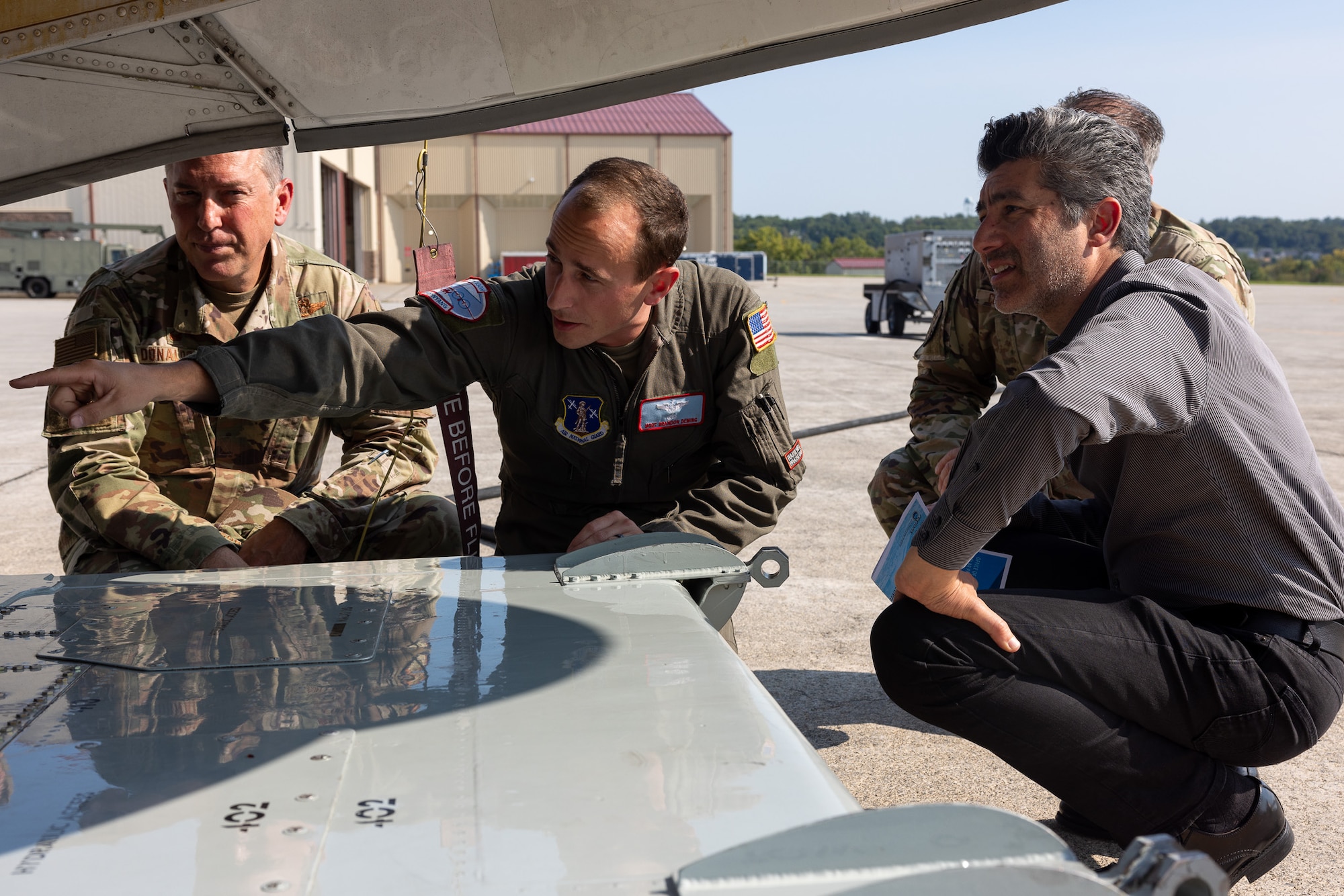 National Science Board are touring a LC-130 Hercules during a visit to Stratton Air National Guard Base on Sept. 12, 2024.