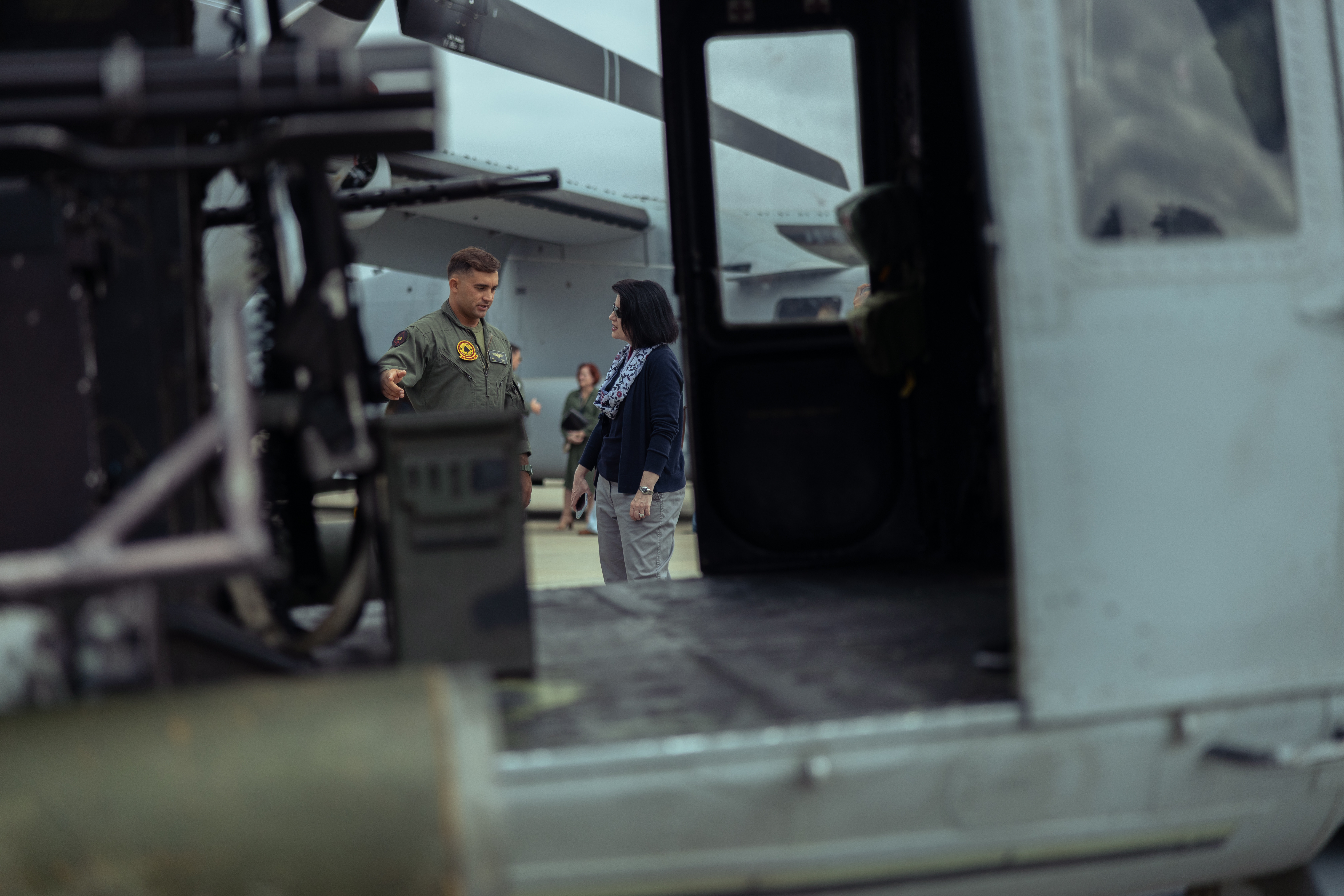U.S. Marine Corps Capt. Christov Dosev, a pilot with Marine Light Attack Helicopter Squadron (HMLA) 267, Marine Aircraft Group 39, 3rd Marine Aircraft Wing, speaks with Mary Beth Morgan, the deputy assistant secretary of defense for Homeland Defense Integration & Defense Support of Civil Authorities, about the UH-1Y Venom helicopter at Marine Corps Air Station Camp Pendleton, Sept. 13, 2024.