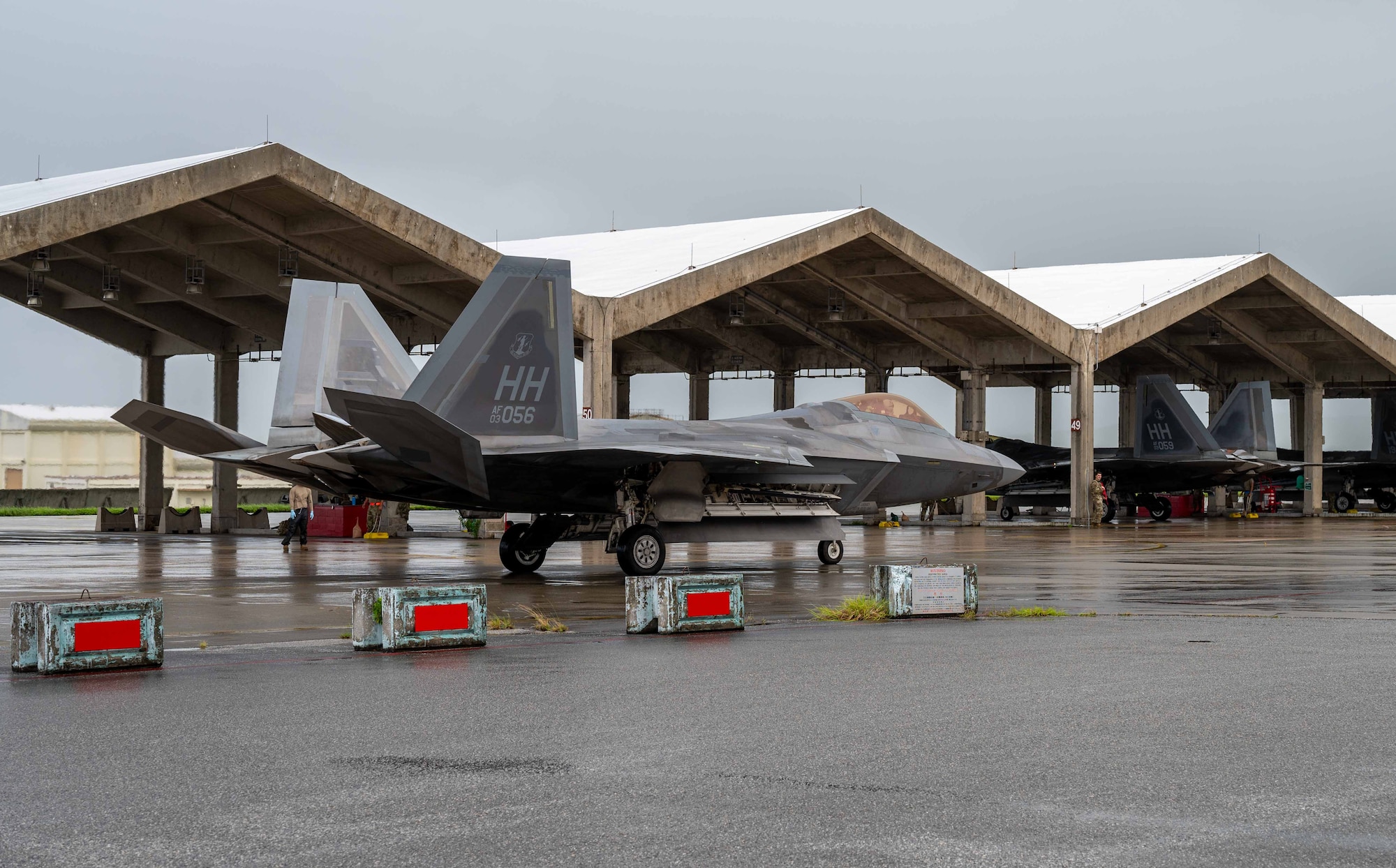 A U.S. Air Force F-22A Raptor, operated by the 199th and 19th Fighter Squadrons, taxis to its parking spot during an agile combat employment exercise, Shogun Shield, at Kadena Air Base, Japan, Sept. 18, 2024