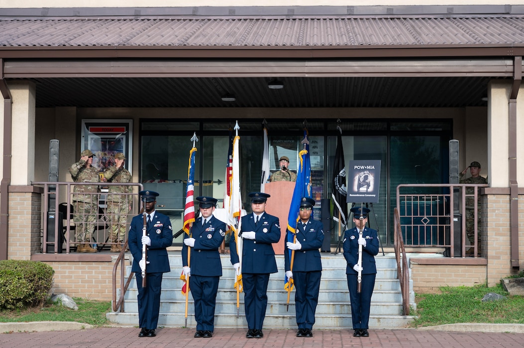 The Osan Air Base honor guard presents the colors during a POW/MIA recognition ceremony at Osan Air Base, Republic of Korea, Sept. 19, 2024. National POW/MIA Recognition Day was established in 1979 through a proclamation signed by former President Jimmy Carter. (U.S. Air Force photo by Staff Sgt. Christopher Tam)