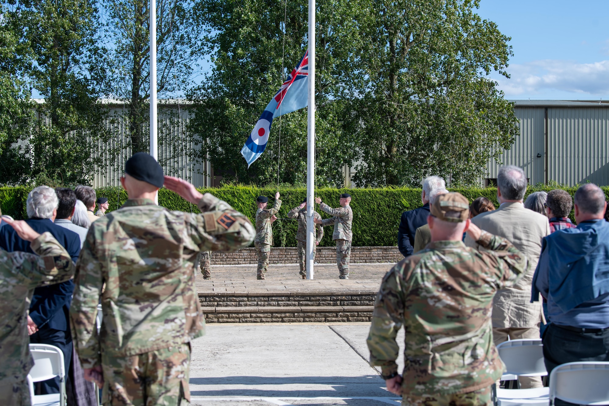 Pathfinders lower the UK Royal Air Force Ensign during a retreat ceremony