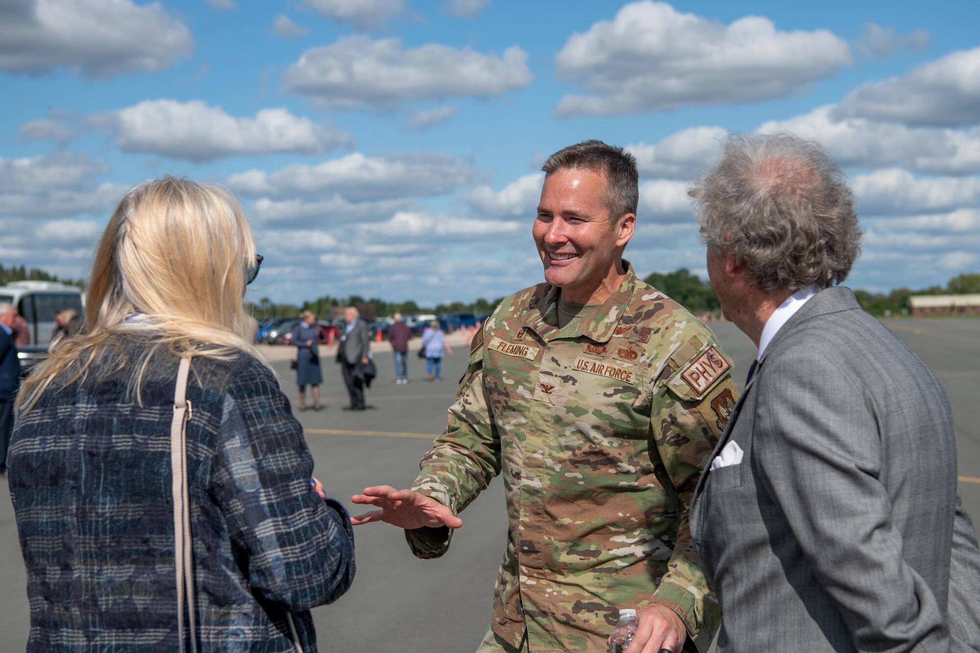 Attendees speak with each out during the RAF Fairford 80th Anniversary Heritage Day