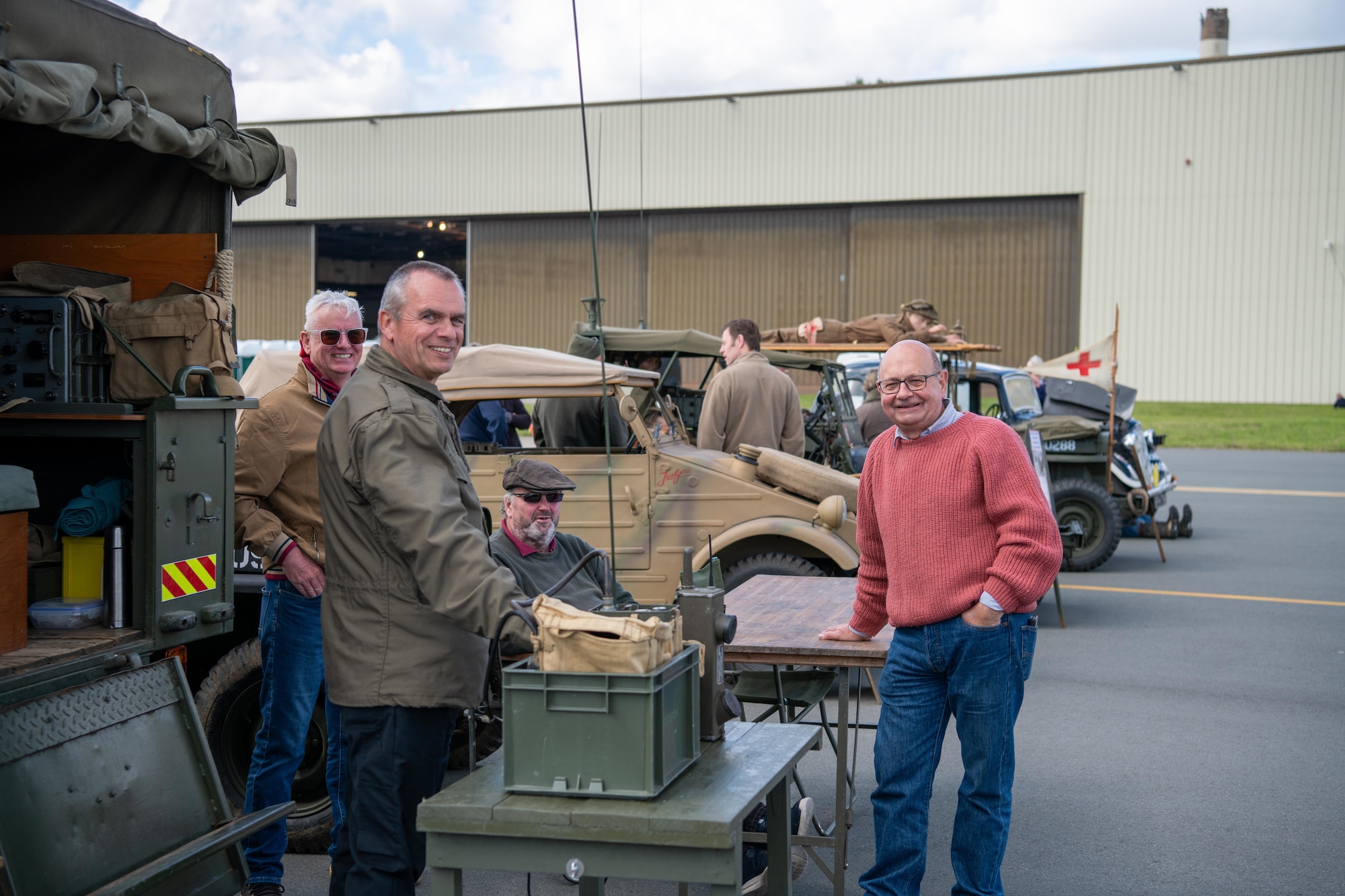 Members of a local historical society smile during the RAF Fairford 80th Anniversary Heritage Day