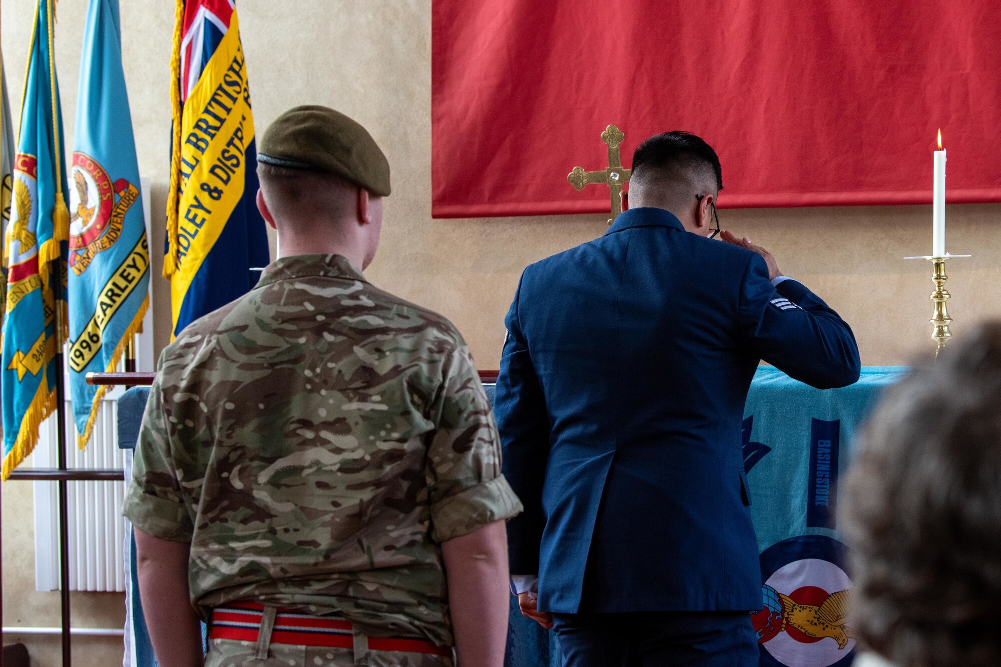 Airman salutes during an 84th anniversary Battle of Britain commemoration service