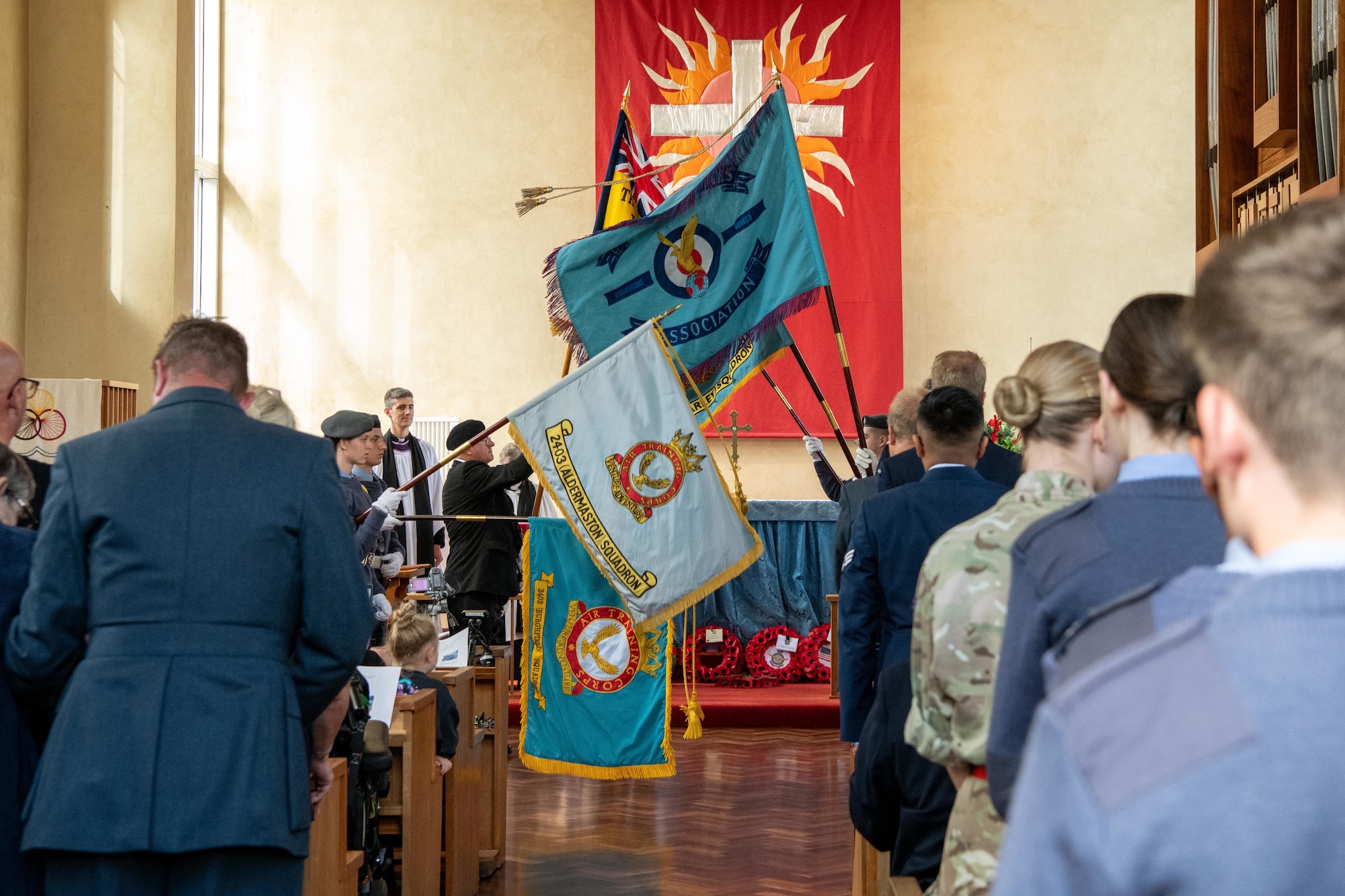 Flags are raised during an 84th anniversary Battle of Britain commemoration service