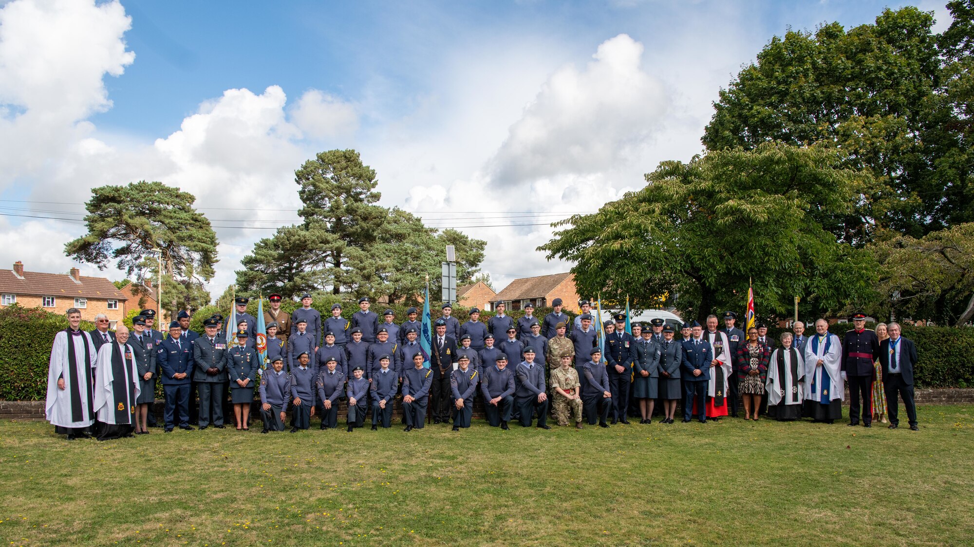 Attendees pose for a group photo after an 84th anniversary Battle of Britain commemoration service