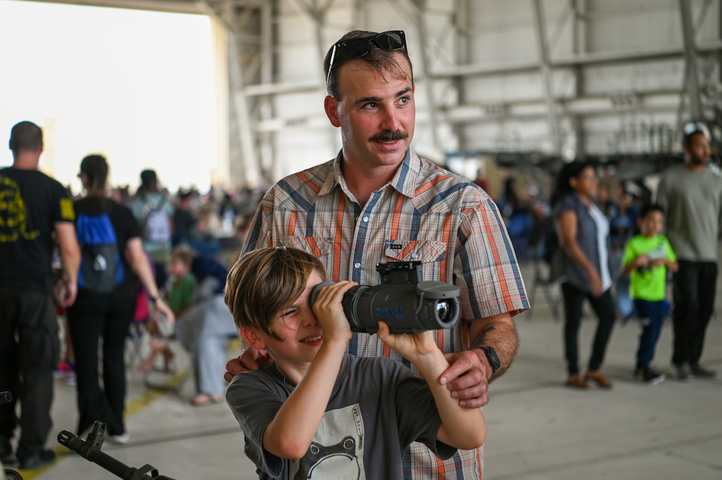 433rd Airlift Wing Reserve Citizen Airmen and their family members enjoy a day of food, live music, games and military displays, including several weapons and equipment displays, during the Alamo Wing’s Family Day at Joint Base San Antonio-Lackland, Texas Sept. 15, 2024.