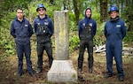 Puget Sound ANT crewmembers worked with Station Neah Bay to reclaim a U.S. Life Saving Service Cemetery on Waadah Island in Seattle, May 2024.  Crew members from left to right: Petty Officer 3rd Class Tristan Colon, Petty Officer 3rd Class Cameron Hamilton, Petty Officer 3rd Class, Mark Shaw, Petty Officer 1st Class Jose Fonseca. (U.S. Coast Guard photo by Chief Petty Officer Jacob Niehaus)