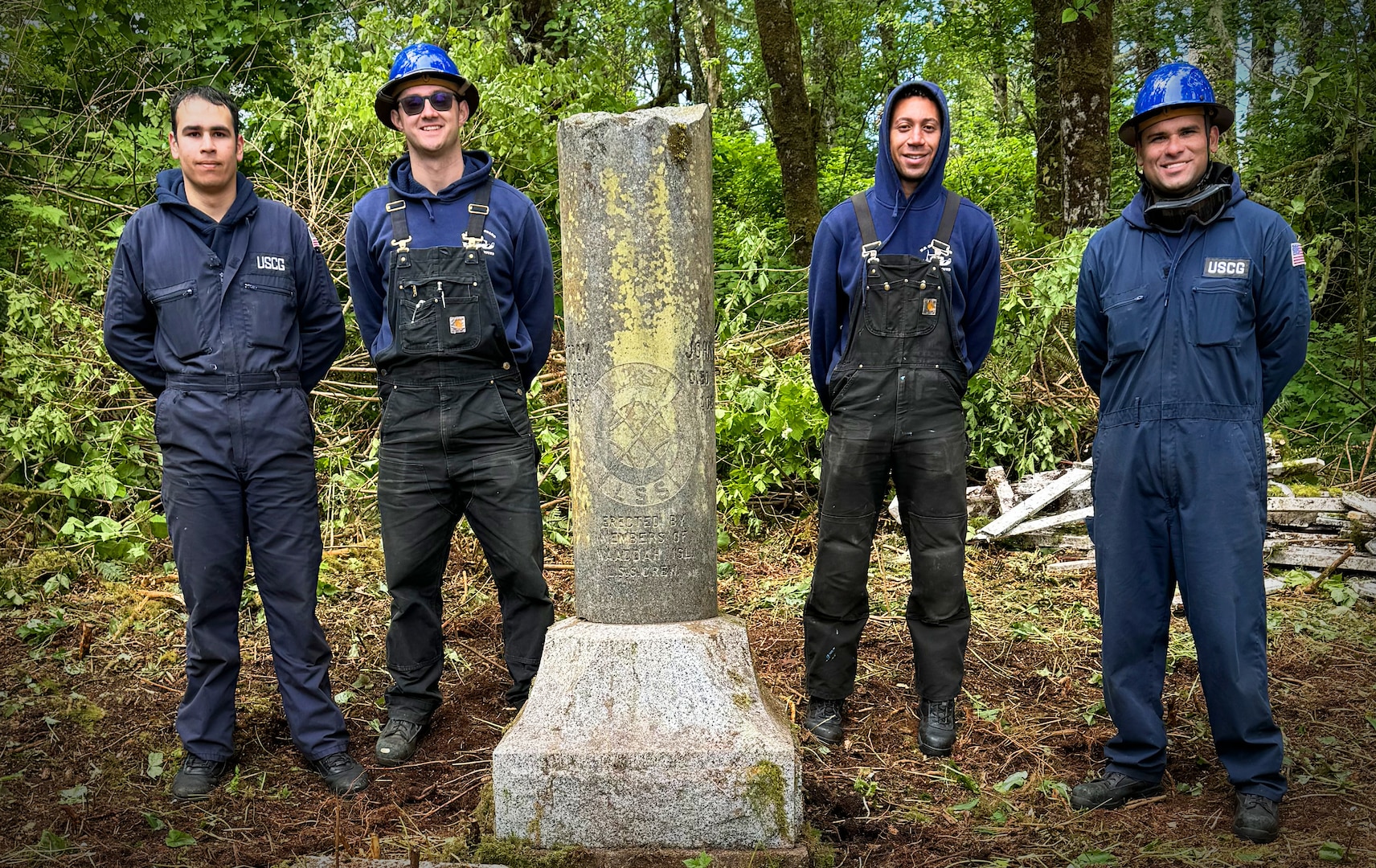 Puget Sound ANT crewmembers worked with Station Neah Bay to reclaim a U.S. Life Saving Service Cemetery on Waadah Island in Seattle, May 2024.  Crew members from left to right: Petty Officer 3rd Class Tristan Colon, Petty Officer 3rd Class Cameron Hamilton, Petty Officer 3rd Class, Mark Shaw, Petty Officer 1st Class Jose Fonseca. (U.S. Coast Guard photo by Chief Petty Officer Jacob Niehaus)