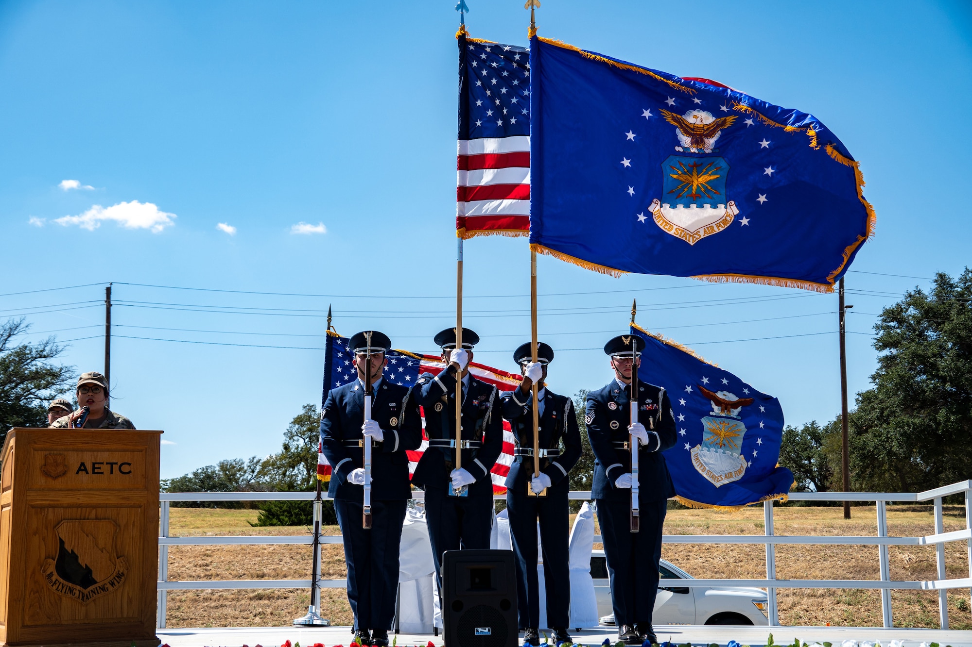 Members of the Sheppard Air Force Base Honor Guard salute during a rendition of the National Anthem during the Opening Ceremony for the POW/MIA Remembrance 24-hr Run/Walk/Ruck September 19, 2024, at Sheppard AFB, Texas.