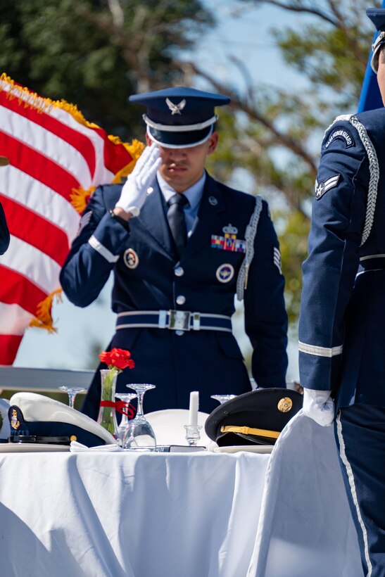 Members of the Sheppard Air Force Base Honor Guard salute during the POW/MIA Missing Man Table Ceremony during the Opening Ceremony for the POW/MIA Remembrance 24-hr Run/Walk/Ruck September 19, 2024, at Sheppard AFB, Texas.