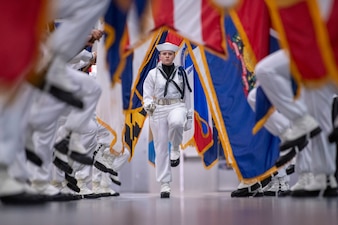 Performance division recruits march on the drill deck during Recruit Training Command's pass in review at Naval Station Great Lakes, Ill.