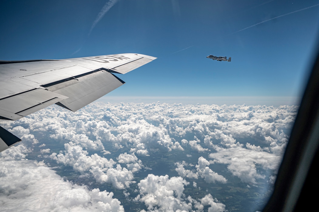 An A-10C Thunderbolt II assigned to the 75th Fighter Squadron flies alongside a KC-135 Stratotanker from the 117th Air Refueling Wing, Sumpter Smith Joint National Guard Base, Birmingham, Alabama, at Moody Air Force Base, Georgia, Sept. 19, 2024. Airmen and families had the opportunity to fly on the KC-135 while watching the aerial refueling operations. (U.S. Air Force photo by Senior Airman Leonid Soubbotine)