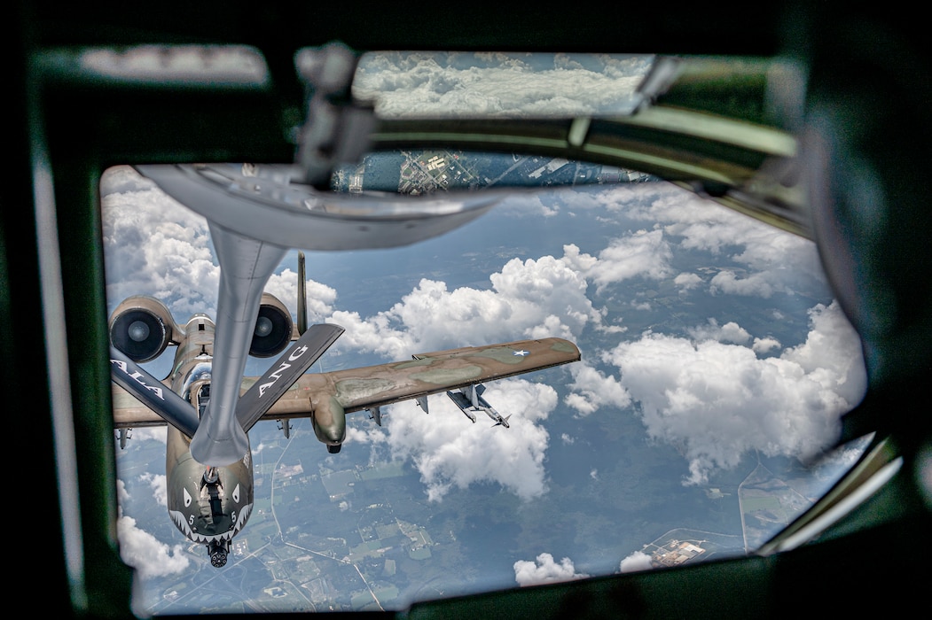 A U.S Air Force KC-135 Stratotanker aircrew from the 117th Air Refueling Wing, Sumpter Smith Joint National Guard Base, Birmingham, Alabama, conducts aerial refueling operations for an A-10C Thunderbolt II assigned to the 23rd Fighter Group at Moody Air Force Base, Georgia, Sept. 19, 2024. During the flight, Airmen and families were able to get an up-close look at aircraft refueling. (U.S. Air Force photo by Senior Airman Leonid Soubbotine)