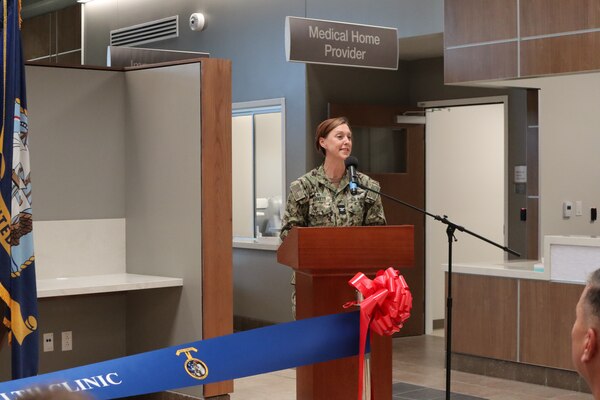 Navy Capt. Jenny Burkett, Naval Hospital Camp Pendleton Director, provides comments during the ribbon-cutting ceremony officially opening the new and improved 21 Area Branch Health Clinic on Sept. 19, 2024. The 21 ABHC provides medical and dental care to the approximately 5,000 active-duty service members serving aboard Camp Del Mar. “Replacing a clinic built in 1966, this new clinic embodies the Navy’s and the Defense Health Agency’s dedication to delivering the highest standard of care, using the latest technology and clinical advancements to serve our troops,” said Burkett during her comments.