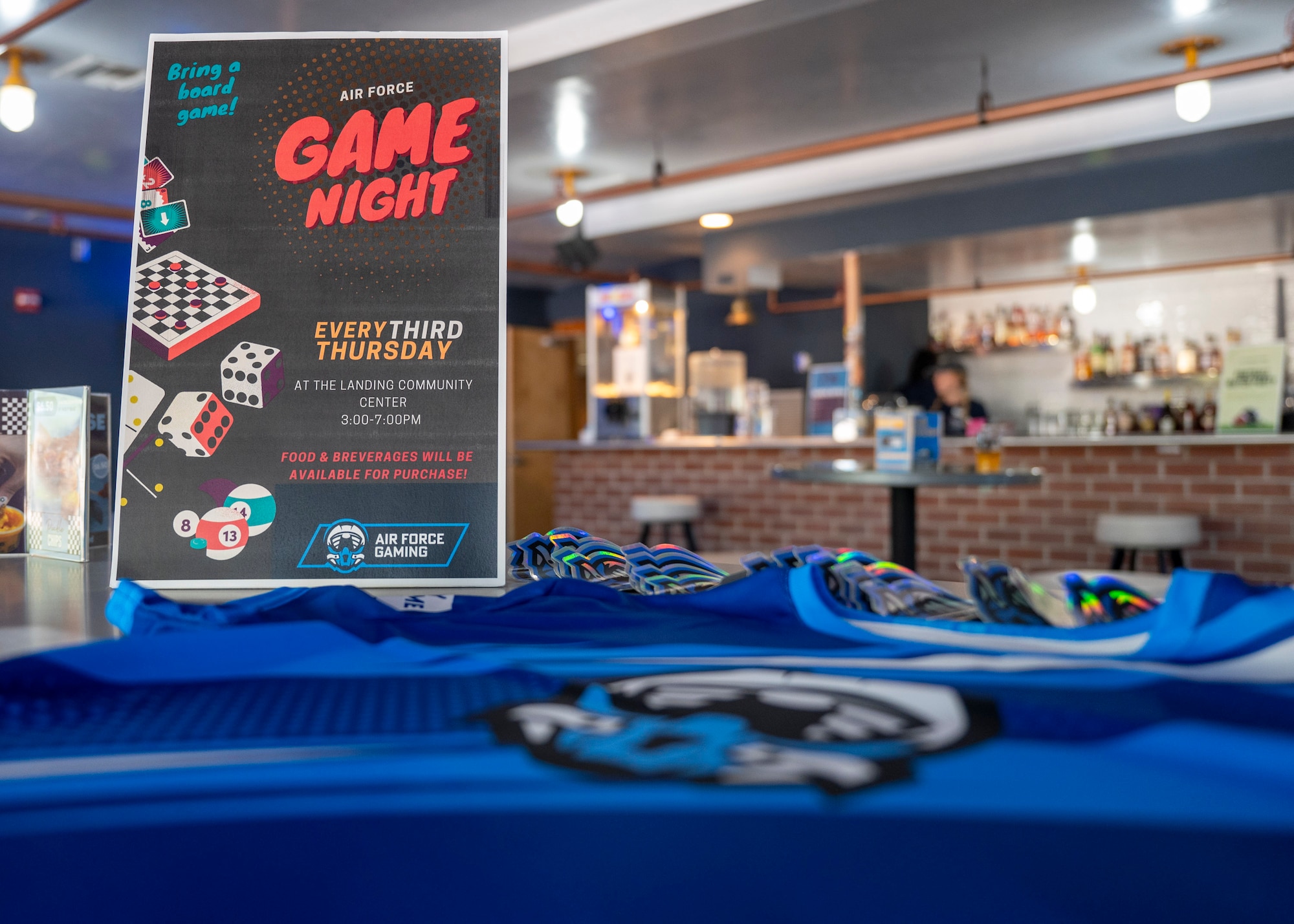 Community Game Night is held by U.S. Air Force gaming ambassadors at Davis-Monthan Air Force Base, Arizona, Sept. 19, 2024. Community Game Night was open to all base members over the age of 13 and was designed to help them make connections while playing games.  (U.S. Air Force photo by Airman 1st Class William Finn V)