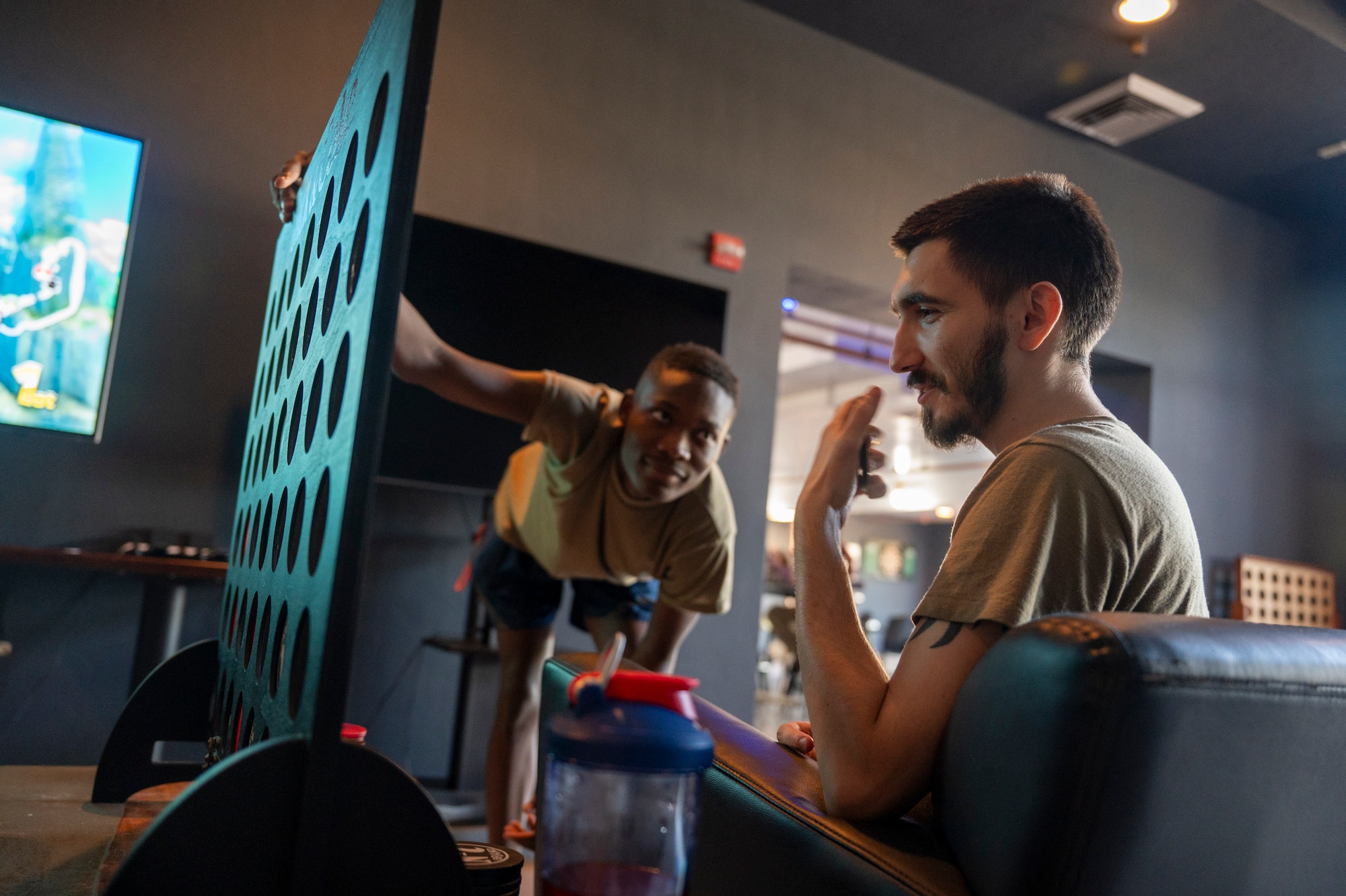 U.S. Air Force Airmen play a game during the Community Game Night at Davis-Monthan Air Force Base, Arizona, Sept. 19, 2024. Air Force Gaming ambassadors put on the event every third Thursday of each month. (U.S. Air Force photo by Airman 1st Class William Finn V)