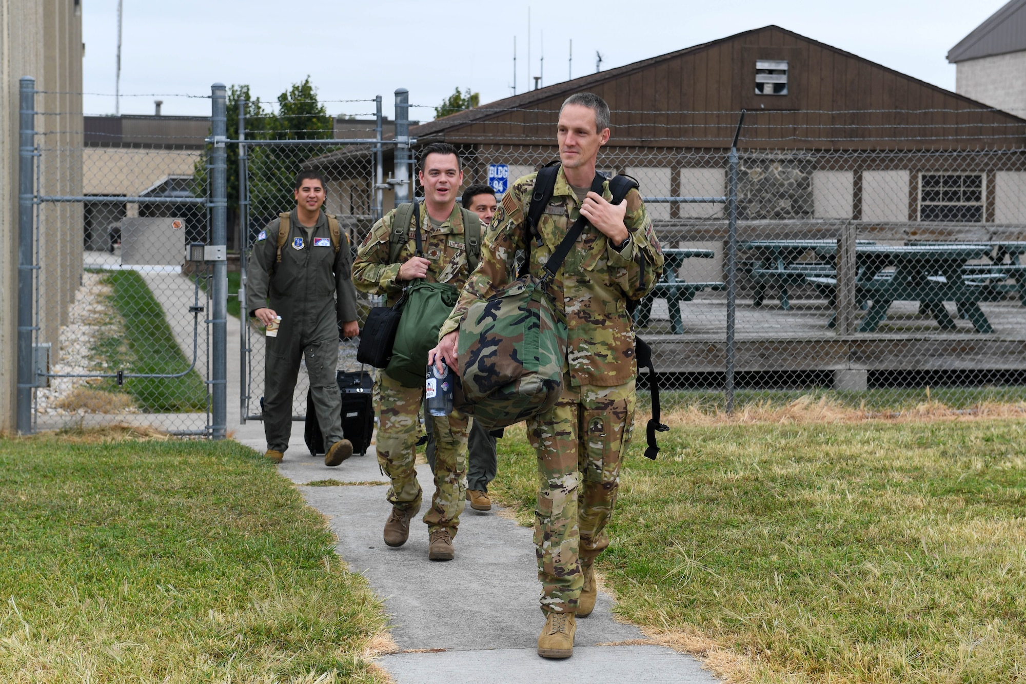 193rd Special Operations Wing crew members walk toward their assigned aircraft for the EC-130J's last mission with the wing, Sept. 18, 2024.