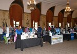 Vendor and information tables at the wellness fair