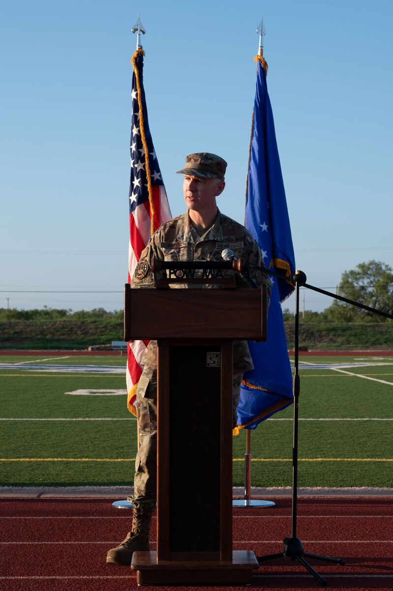 U.S. Air Force Col. Thomas Wilson, 17th Training Wing deputy commander, speaks at the Mathis Fitness Center outdoor track during the opening ceremony of POW/MIA Remembrance Week at Goodfellow Air Force Base, Texas, Sept. 19, 2024. Wilson emphasized the importance of honoring and remembering service members who are Prisoners of War or are still Missing in Action to ensure their bravery and sacrifice are never forgotten. (U.S. Air Force photo by Airman 1st Class Brian Lummus)