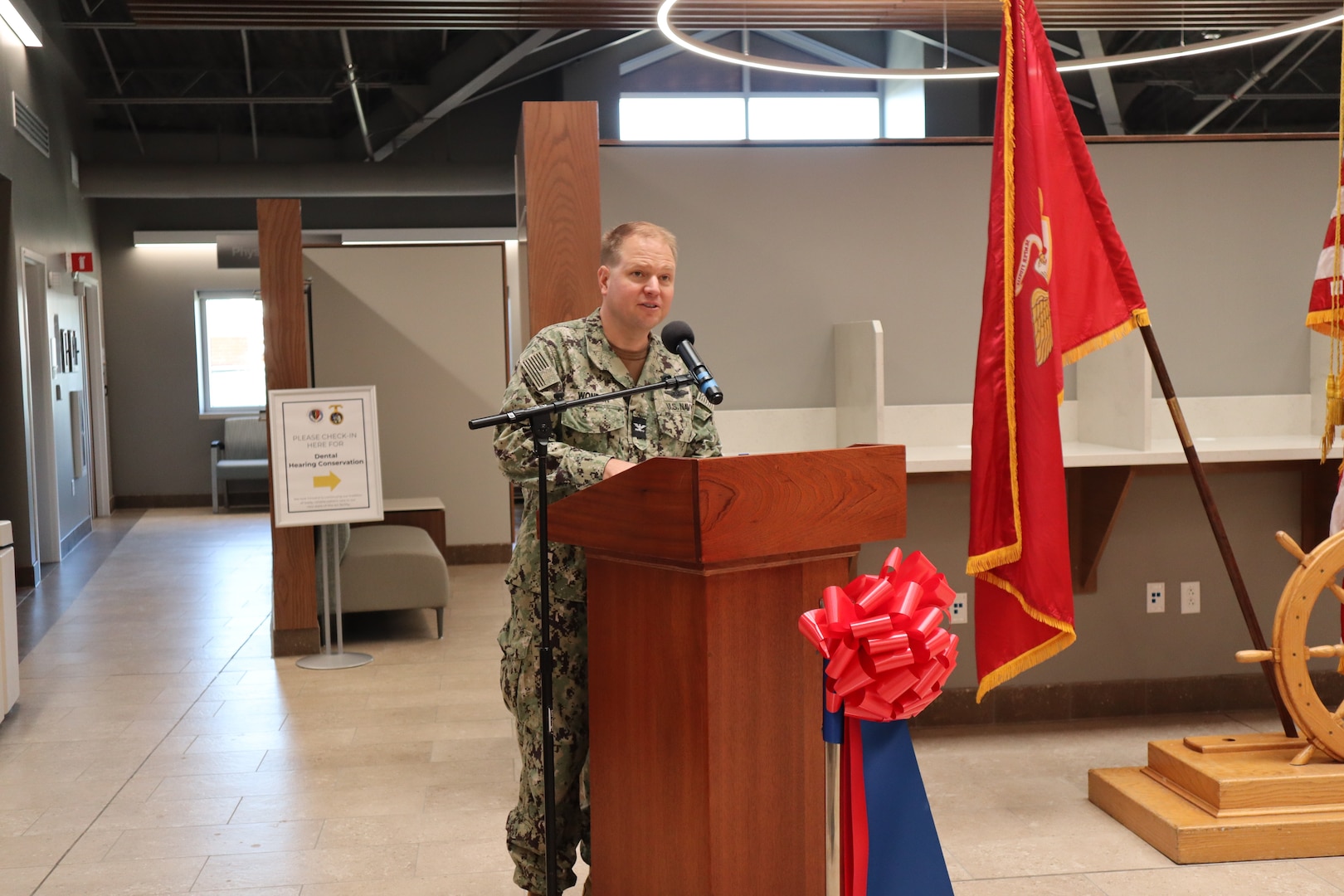 Navy Capt. Nathan Wonder, Naval Hospital Camp Pendleton director of branch clinics and master of ceremonies, provides opening comments during the ribbon-cutting ceremony officially opening the new and improved 21 Area Branch Health Clinic on Sept. 19, 2024. The 21 ABHC provides medical and dental care to the approximately 5,000 active-duty service members serving aboard Camp Del Mar. “This state-of-the-art facility was designed to ensure the readiness of the 5,000 Warfighters across the various tenant commands,” said Wonder during his comments.