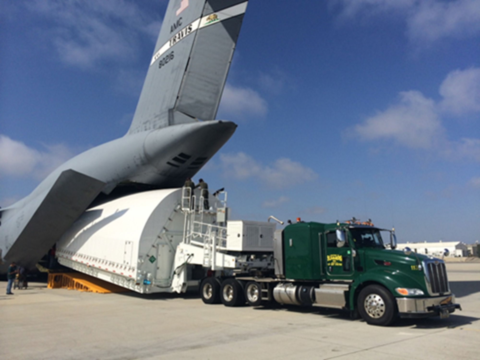 A specialized Space Vehicle Container is loaded onto a C-5 Super Galaxy under the watch of Space Systems Command’s Airlift Operations team.
